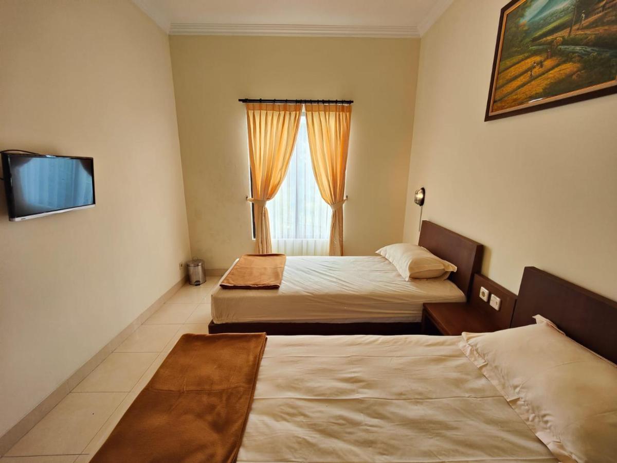 Adiputra Guesthouse 2 By Homiq Ngabean المظهر الخارجي الصورة